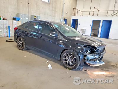 Czwarte zdjęcie samochodu z boku: 2018 FORD FOCUS SEL VIN:1FADP3H22JL259762 - miniatura