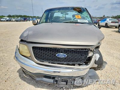 Zdjęcie 11 z 12 samochodu: 2001 FORD F150 SUPERCREW VIN:1FTRW07L91KB30659 - miniatura