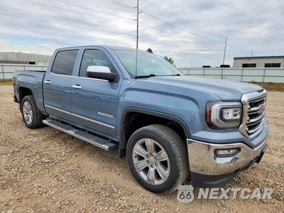 Czwarte zdjęcie samochodu z boku: 2016 GMC SIERRA K1500 SLT VIN:3GTU2NEC1GG312930 - miniatura