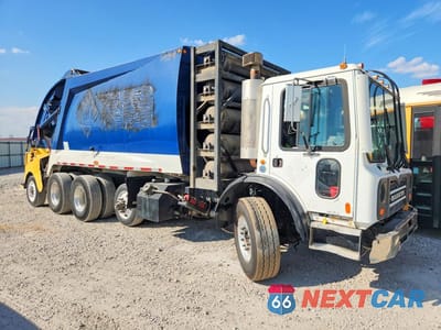 Czwarte zdjęcie samochodu z boku: 2013 MACK 600 MRU600 VIN:1M2AV17C7DM010353 - miniatura