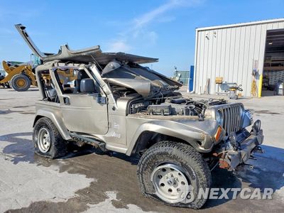 Czwarte zdjęcie samochodu z boku: 2004 JEEP WRANGLER / TJ SAHARA VIN:1J4FA59S24P801111 - miniatura