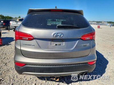 Zdjęcie 6 z 12 samochodu: 2015 HYUNDAI SANTA FE SPORT 2.0T VIN:5XYZWDLA4FG264438 - miniatura