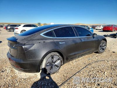 Trzecie zdjęcie samochodu z tyłu: 2019 TESLA MODEL 3 VIN:5YJ3E1EA9KF190648 - miniatura