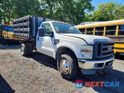 Czwarte zdjęcie samochodu z boku: 2010 FORD F350 SUPER - DELIVERY TRUCK VIN:1FDWF3HR0AEB26663 - miniatura