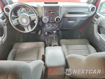 Zdjęcie 8 z 13 samochodu: 2012 JEEP WRANGLER UNLIMITED SAHARA VIN:1C4BJWEG7CL123554 - miniatura