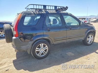 Trzecie zdjęcie samochodu z tyłu: 2003 HONDA CR-V LX VIN:JHLRD68543C011748 - miniatura