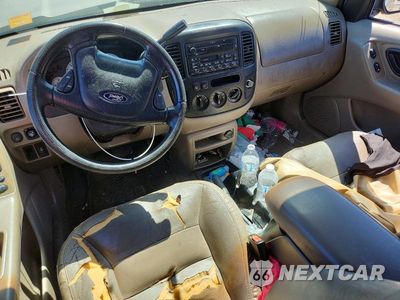 Zdjęcie 8 z 14 samochodu: 2001 FORD ESCAPE XLT VIN:1FMYU03181KF70924 - miniatura