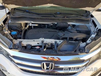 Zdjęcie 12 z 13 samochodu: 2017 HONDA PILOT EXL VIN:5FNYF5H53HB012865 - miniatura