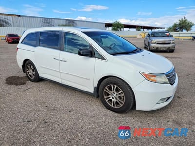 Czwarte zdjęcie samochodu z boku: 2012 HONDA ODYSSEY EXL VIN:5FNRL5H66CB120878 - miniatura
