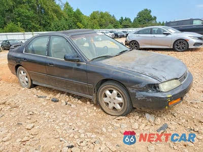 Czwarte zdjęcie samochodu z boku: 1995 HONDA ACCORD EX VIN:1HGCE666XSA019277 - miniatura