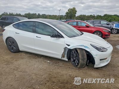 Czwarte zdjęcie samochodu z boku: 2021 TESLA MODEL 3 VIN:5YJ3E1EA8MF915823 - miniatura