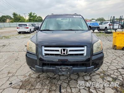 Piąte zdjęcie samochodu w środku: 2007 HONDA PILOT EX VIN:2HKYF184X7H509380 - miniatura