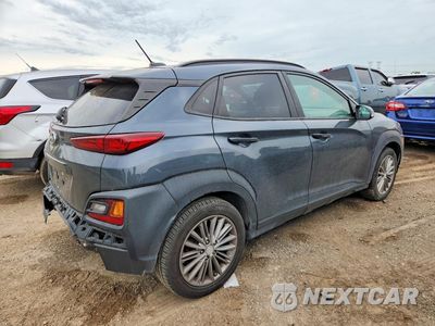 Trzecie zdjęcie samochodu z tyłu: 2018 HYUNDAI KONA SEL VIN:KM8K22AA5JU072081 - miniatura