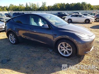 Czwarte zdjęcie samochodu z boku: 2021 TESLA MODEL Y VIN:5YJYGDEE2MF189977 - miniatura