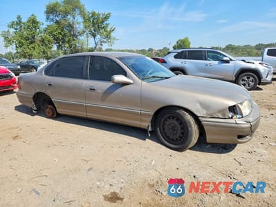 Czwarte zdjęcie samochodu z boku: 1999 TOYOTA AVALON XL VIN:4T1BF18B2XU327209 - miniatura