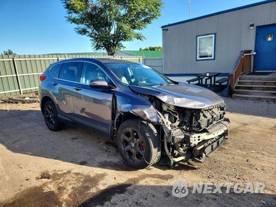 Czwarte zdjęcie samochodu z boku: 2018 HONDA CR-V EXL VIN:2HKRW2H86JH623266 - miniatura