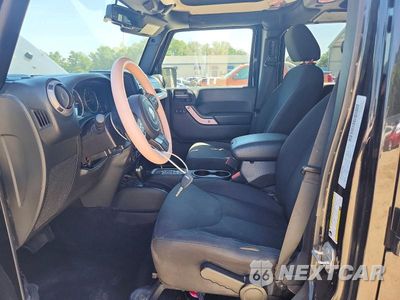Zdjęcie 7 z 14 samochodu: 2015 JEEP WRANGLER UNLIMITED SPORT VIN:1C4BJWDG1FL762468 - miniatura
