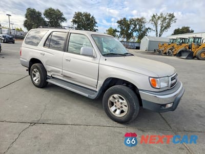 Czwarte zdjęcie samochodu z boku: 1999 TOYOTA 4RUNNER SR5 VIN:JT3GN86R3X0105912 - miniatura