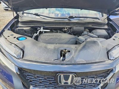 Zdjęcie 11 z 13 samochodu: 2021 HONDA PASSPORT ELITE VIN:5FNYF8H0XMB024091 - miniatura