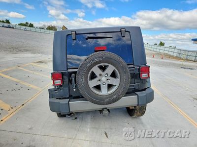 Zdjęcie 6 z 13 samochodu: 2010 JEEP WRANGLER SPORT VIN:1J4AA2D15AL230580 - miniatura