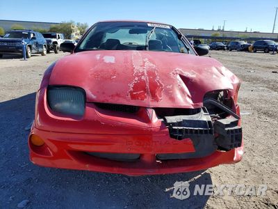 Piąte zdjęcie samochodu w środku: 2000 PONTIAC SUNFIRE SE VIN:1G2JB5243Y7414182 - miniatura