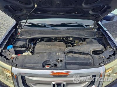 Zdjęcie 12 z 14 samochodu: 2011 HONDA PILOT EXL VIN:5FNYF4H51BB030556 - miniatura