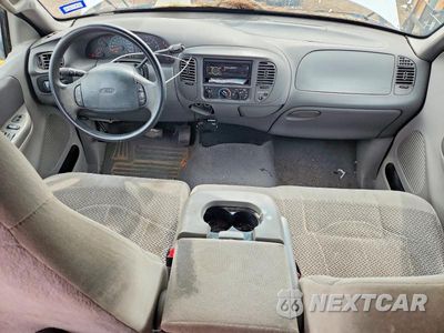 Zdjęcie 8 z 12 samochodu: 2000 FORD F150 VIN:1FTRX17L3YKA88180 - miniatura