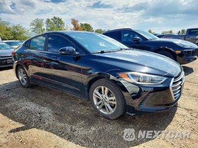 Czwarte zdjęcie samochodu z boku: 2017 HYUNDAI ELANTRA SE VIN:KMHD84LF7HU060553 - miniatura