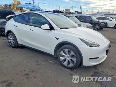 Czwarte zdjęcie samochodu z boku: 2024 TESLA MODEL Y VIN:7SAYGAEE5RF046188 - miniatura