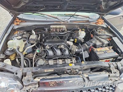 Zdjęcie 12 z 13 samochodu: 2006 FORD ESCAPE XLT VIN:1FMYU03186KC05635 - miniatura