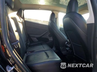 Zdjęcie 10 z 12 samochodu: 2023 TESLA MODEL Y VIN:7SAYGDEF5PF590827 - miniatura