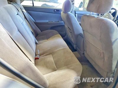 Zdjęcie 10 z 12 samochodu: 2004 TOYOTA CAMRY LE VIN:4T1BE32KX4U362048 - miniatura