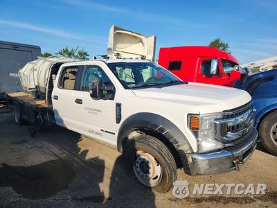 Czwarte zdjęcie samochodu z boku: 2020 FORD F550 SUPER - FLAT BED TRUCK VIN:1FD0W5HT7LEE09710 - miniatura