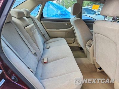Zdjęcie 10 z 12 samochodu: 2003 TOYOTA AVALON XL VIN:4T1BF28B23U323189 - miniatura