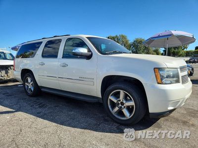Czwarte zdjęcie samochodu z boku: 2014 CHEVROLET SUBURBAN C1500 LTZ VIN:1GNSCKE09ER213527 - miniatura
