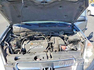 Zdjęcie 12 z 13 samochodu: 2005 HONDA CR-V LX VIN:JHLRD68525C010925 - miniatura