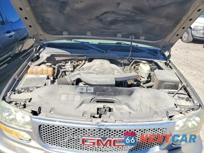 Zdjęcie 12 z 13 samochodu: 2003 GMC YUKON DENALI VIN:1GKEK63U73J172336 - miniatura
