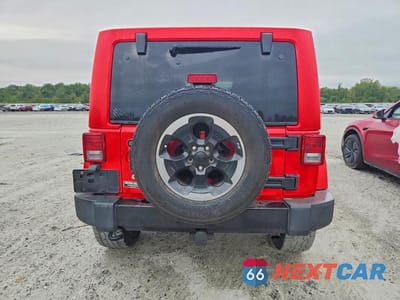 Zdjęcie 6 z 13 samochodu: 2014 JEEP WRANGLER UNLIMITED SAHARA VIN:1C4HJWEG0EL324418 - miniatura