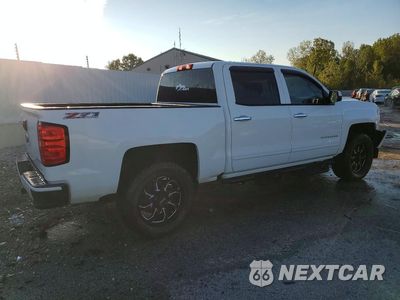 Trzecie zdjęcie samochodu z tyłu: 2016 CHEVROLET SILVERADO K1500 LT VIN:3GCUKREC6GG205198 - miniatura