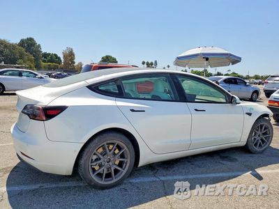 Trzecie zdjęcie samochodu z tyłu: 2022 TESLA MODEL 3 VIN:5YJ3E1EA6NF375650 - miniatura