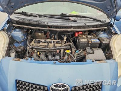 Zdjęcie 11 z 13 samochodu: 2008 TOYOTA YARIS BASE VIN:JTDJT923185165576 - miniatura