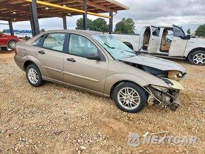 Czwarte zdjęcie samochodu z boku: 2005 FORD FOCUS ZX4 VIN:1FAFP34N35W256673 - miniatura