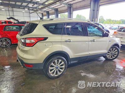 Trzecie zdjęcie samochodu z tyłu: 2018 FORD ESCAPE TITANIUM VIN:1FMCU9J93JUB43985 - miniatura