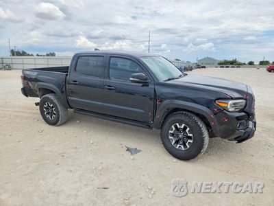 Czwarte zdjęcie samochodu z boku: 2021 TOYOTA TACOMA TRD OFF-ROAD VIN:3TMCZ5ANXMM433578 - miniatura