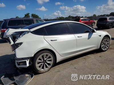 Trzecie zdjęcie samochodu z tyłu: 2023 TESLA MODEL 3 VIN:5YJ3E1EA2PF510058 - miniatura