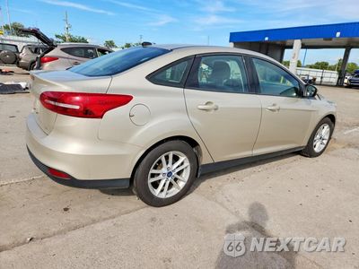 Trzecie zdjęcie samochodu z tyłu: 2017 FORD FOCUS SE VIN:1FADP3F25HL318364 - miniatura