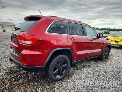 Trzecie zdjęcie samochodu z tyłu: 2013 JEEP GRAND CHEROKEE LAREDO VIN:1C4RJFAG3DC502721 - miniatura