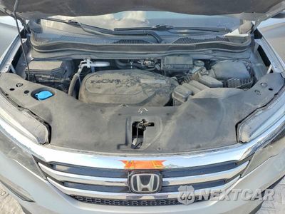 Zdjęcie 12 z 13 samochodu: 2018 HONDA PILOT ELITE VIN:5FNYF6H01JB031950 - miniatura