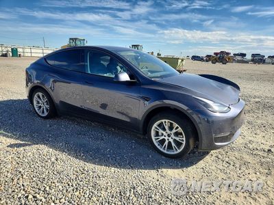 Czwarte zdjęcie samochodu z boku: 2023 TESLA MODEL Y VIN:7SAYGAEE4PF607834 - miniatura