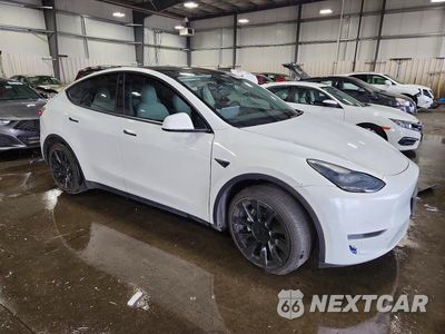 Czwarte zdjęcie samochodu z boku: 2022 TESLA MODEL Y VIN:7SAYGDEE1NF312852 - miniatura